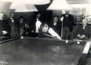 Conan Doyle playing the winning stroke in the second round of the Billiard Association Amateur Championship 